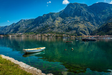 Idyllic morning scene of boats moored in the Bay of Kotor, Montenegro in summer
