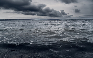 dark stormy sea and dramatic clouds, gloomy nature