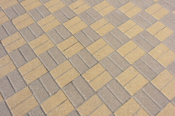 road surface texture background, yellow-brown paving stones.