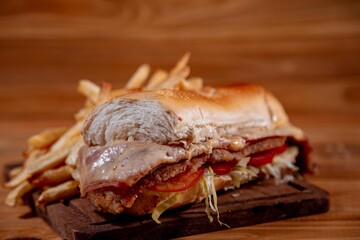 Meat sandwich with wood backgound
