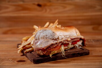 Meat sandwich with wood backgound