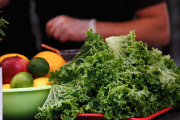 fresh salad and fruits on the table close up