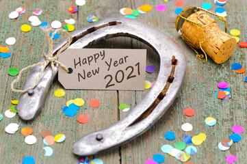 Happy new year 2021 with horseshoe as talisman