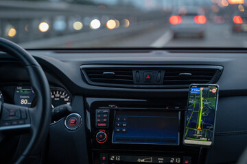 car dashboard and Navigator on your phone