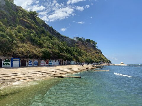The Passetto beach with the famous Grotte, they are the shelter of small fishing boats.