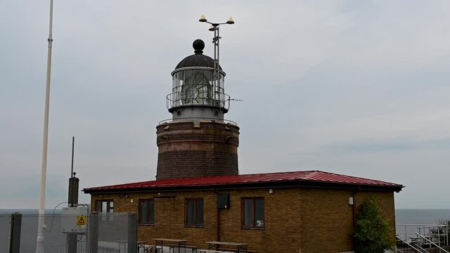 The old lighthouse called Kullens fyr on a grey summer afternoon in Sk&aring;ne, Sweden