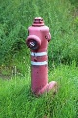 Brown park bench on a paved surface