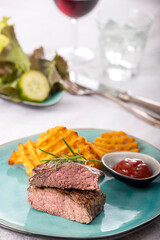 steak with potato lattices