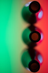 Top view of wine bottles on a colourful background