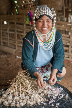 Woman in Ahkha tribe during garlic harvest, Shan State, Keng Tung, Burma