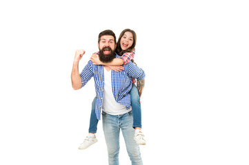 Stay childish. Small child and bearded man enjoy celebrating. Happy family celebrating holidays. Father carry daughter piggyback. Fathers day. Holiday celebration. Happy celebrating. Keep celebrating