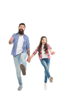 We are on our way. Active family walk holding hands. Happy child and father enjoy studio photo shoot. Active lifestyle. Fun and entertainment. Family activity to do together. Active and energetic