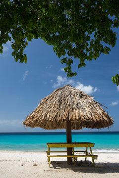 Beach umbrella on Kleine Knip Beach, Curacao, Caribbean