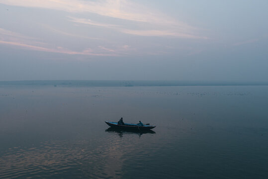 Fishermen in boat, Varanasi, Uttar Pradesh, India
