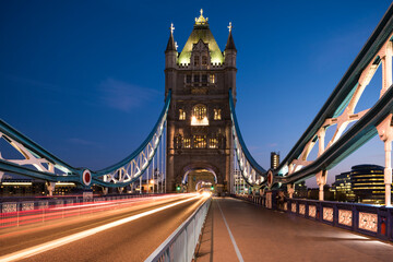 Fototapeta na wymiar View of traffic light trails on Tower Bridge at night, London, UK