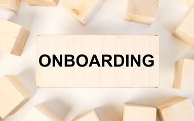 onboarding. text on wood block on light background. Business concept for Action Process of...