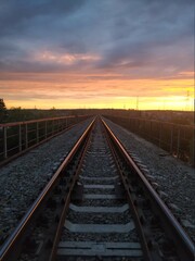 Fototapeta na wymiar railway at sunset
