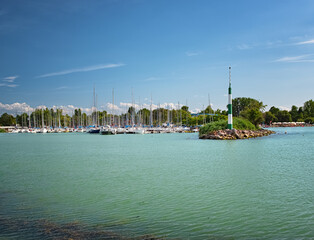 Fototapeta na wymiar Harbor with sailboats in the harbor of Balatonlelle, Hungary