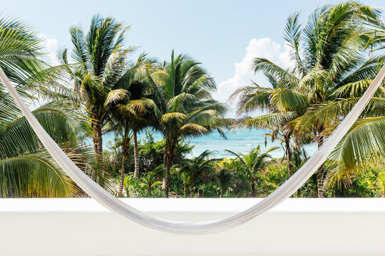 Hammock, palms trees and coast, Tulum, Riviera Maya, Mexico