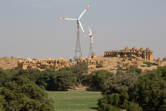 Wind turbines and  Bada Bagh on hill, Jaisalmer, Rajasthan, India
