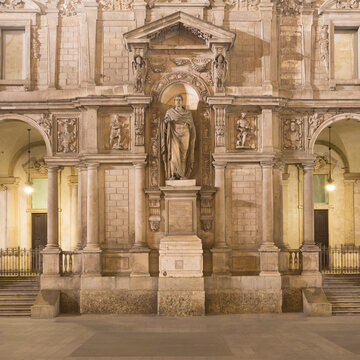 Statue of Saint Ambrose (Aurelius Ambrosius), Bishop of Milan in 374 AD outside the Palazzo Giureconsulti, Milan, Italy