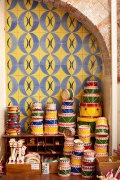 Wooden crafted products display, tiled wall background, Lisbon, Portugal