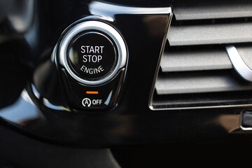 Luxury car engine start and stop button