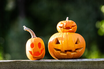 Halloween pumpkins or jack-o-lantern at home terrace. Decoration and holidays concept