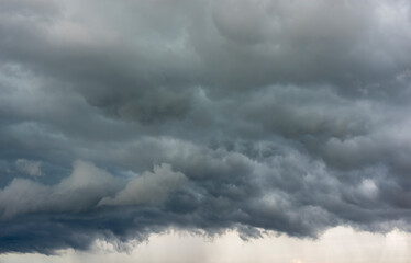 Fototapeta premium dark Cumulus clouds gathered in clouds