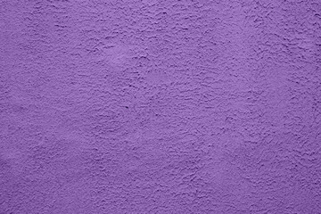 Purple wall with cracked paint surface. Grunge background or texture.