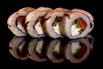 Fresh sushi rolls prepared from the best varieties of fish and seafood