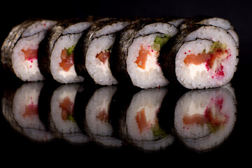 Fresh sushi rolls prepared from the best varieties of fish and seafood