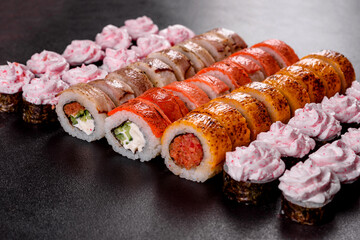 Fresh sushi rolls prepared from the best varieties of fish and seafood