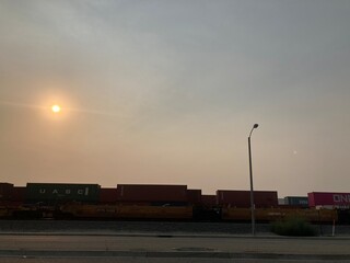 Fototapeta premium freight train yard at sunset