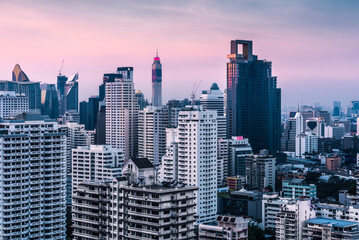 Fototapeta na wymiar Skyscrapers and Modern Buildings in Bangkok Downtown, Thailand at Twilight