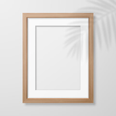 Vector 3d Realistic A4 Brown Wooden Simple Modern Frame on a White Wall Background with Leaf Shadow. It can be used for presentations. Design Template for Mockup, Front View