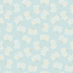 Simple vector floral seamless pattern. Abstract background with simple small flowers. Liberty style wallpapers. Subtle ditsy texture. Light blue, yellow and white color. Repeat design for textile