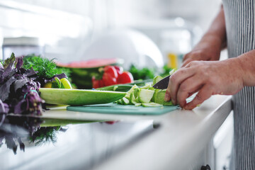 Woman cooking vegetables in the kitchen