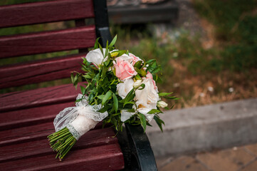bridal bouquet of white and pink roses