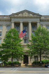 Fototapeta na wymiar US Department of Commerce main entrance at 1401 Constitution Avenue NW in Federal Triangle in Washington, District of Columbia DC, USA.