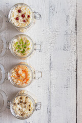 Sauerkraut jars on wooden table with copy space