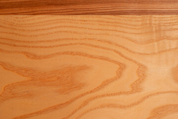 The structure of natural ash wood, tinted oak. Hardwood. Creative vintage background. Imitation of aging.