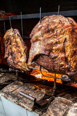 Brazilian style beef ribs Barbecue grill on skewers  at a churrascaria steakhouse in Brazil.