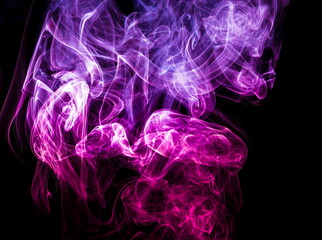 Obraz premium Colored smoke on black background