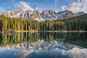 Reflection of trees and mountains on lake
