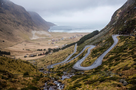 View of mountain road with sea in background