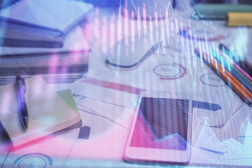 Double exposure of forex chart drawing and cell phone background. Concept of financial data analysis