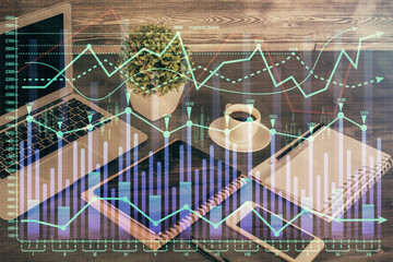 Double exposure of financial graph drawing and cell phone background. Concept of forex trading