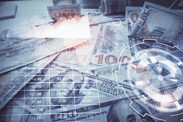 Multi exposure of forex chart drawing over us dollars bill background. Concept of financial success...