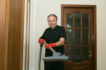 Emotions of a middle-aged man before cleaning an apartment. Daily cleaning of the premises. Humor....